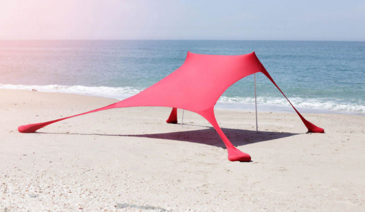 Oaken Sky Shores offers the Lycra Sky Shade Beach Tent: a lightweight, portable awning for ultimate sun protection. Easy to set up, it provides ample shade for beach days, camping, or any outdoor activity.